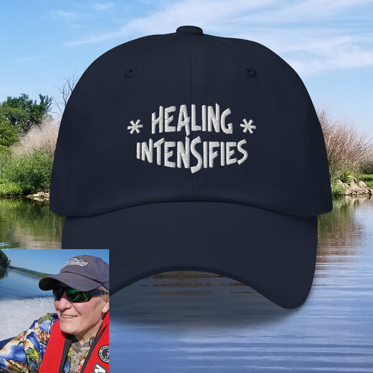 Healing Intensifies Hat - light logo